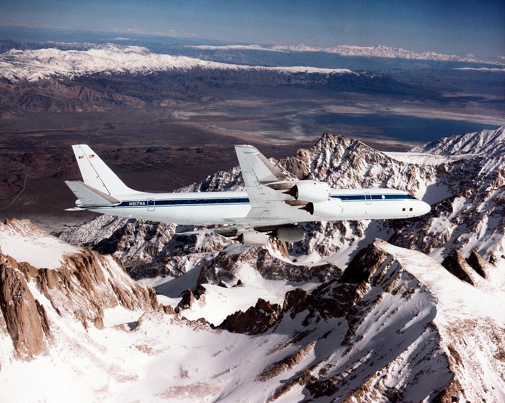 The DC-8 banking over the jagged peak of Mount Whitney on a February 25, 1998 flight. Original from NASA. Digitally enhanced…