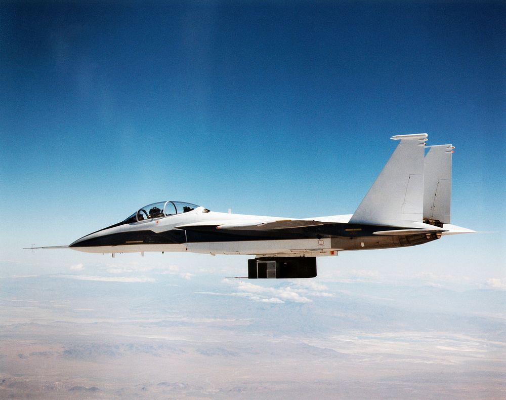 In-flight photo of the NASA F-15B used in tests of the X-33 Thermal Protection System (TPS) materials. Original from NASA.…