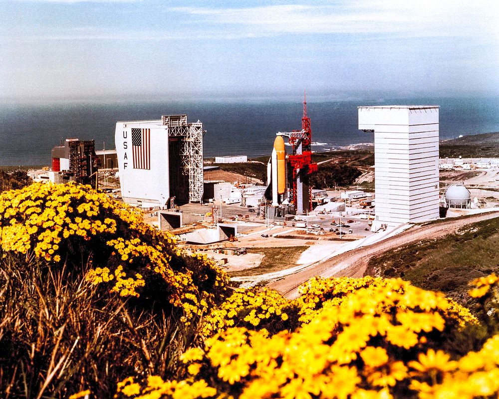 At Vandenberg Air Force Base in the early '80s, the Space Shuttle Enterprise undergoes Pathfinder fit checks at a tower.…