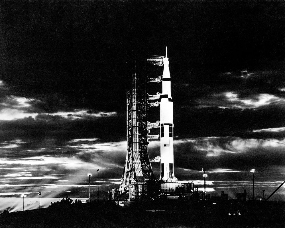 Searchlights illuminate this nighttime scene at Pad A, Launch Complex 39, Kennedy Space Center, Florida, showing the Apollo…