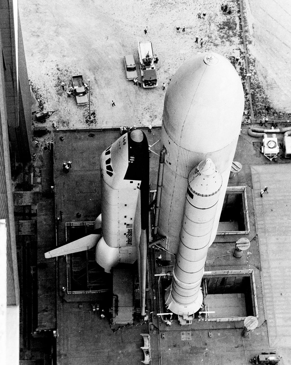Space shuttle orbiter 101 Enterprise makes its first appearance as it is slowly rolled out the front door of the huge…
