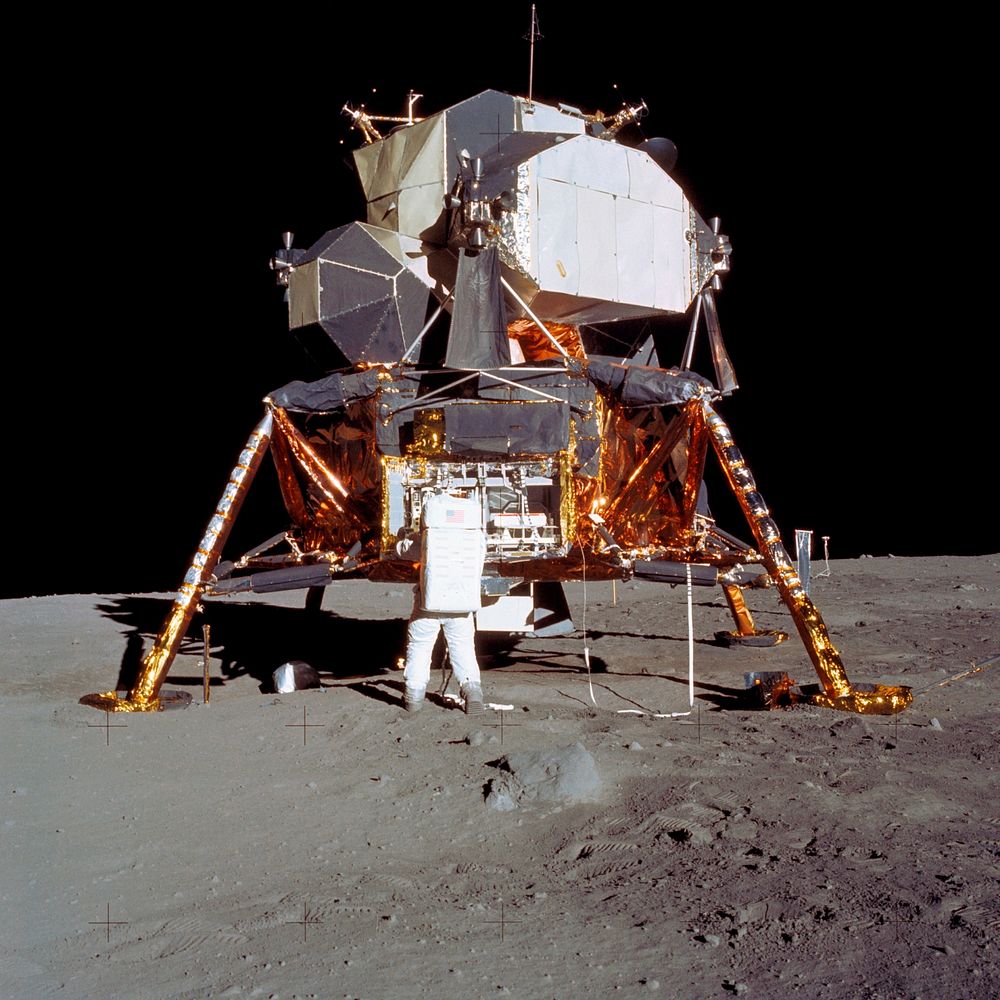 Astronaut Edwin E Aldrin Jr, Lunar Module (LM) pilot descends from the LM. Original from NASA . Digitally enhanced by…