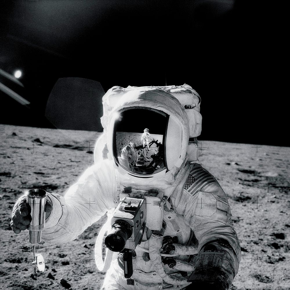 Astronaut Alan Bean holds Special Environmental Sample Container. Original from NASA. Digitally enhanced by rawpixel.