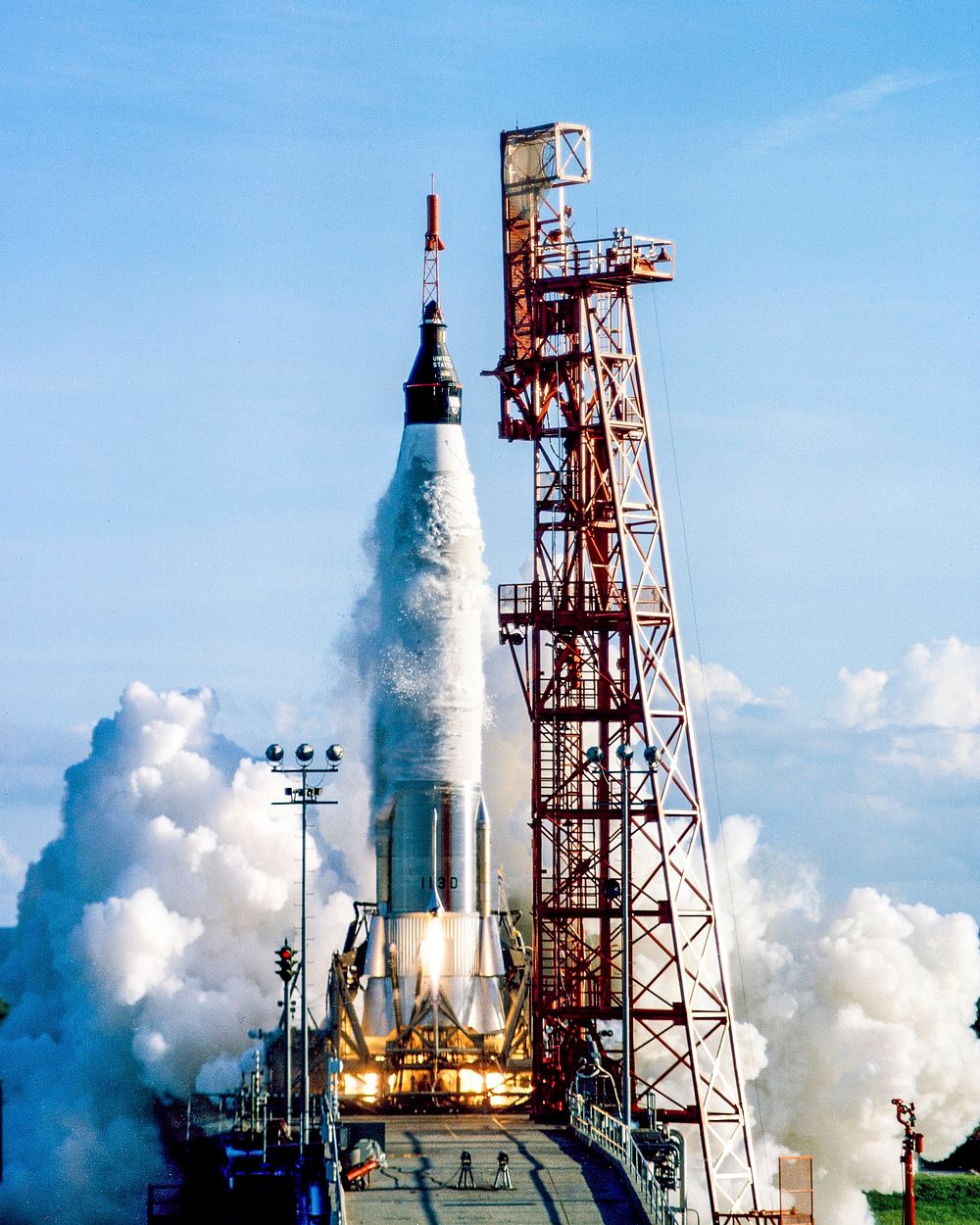 An Atlas launch vehicle lifts off with the Mercury spacecraft Sigma 7 atop with astronaut Walter M. Schirra Jr. aboard.…