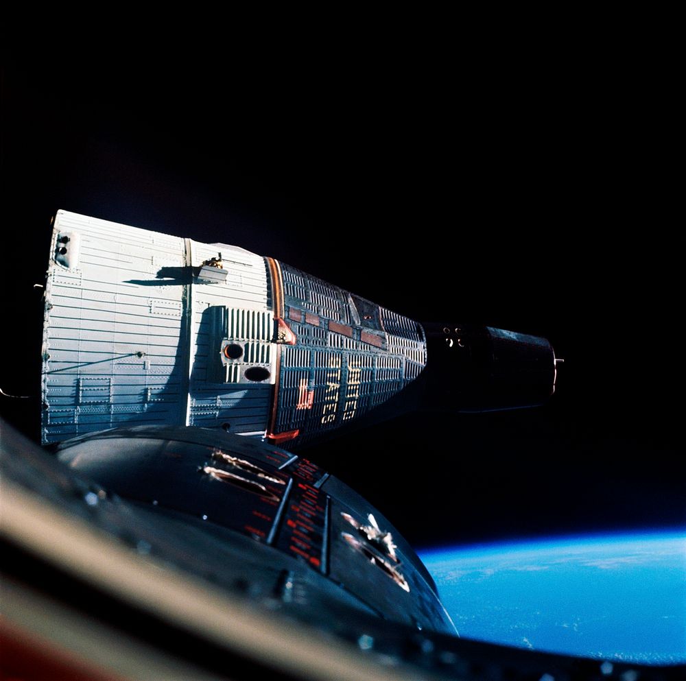 Gemini-7 spacecraft, taken through the hatch window of the Gemini-6 spacecraft during rendezvous at an altitude of…