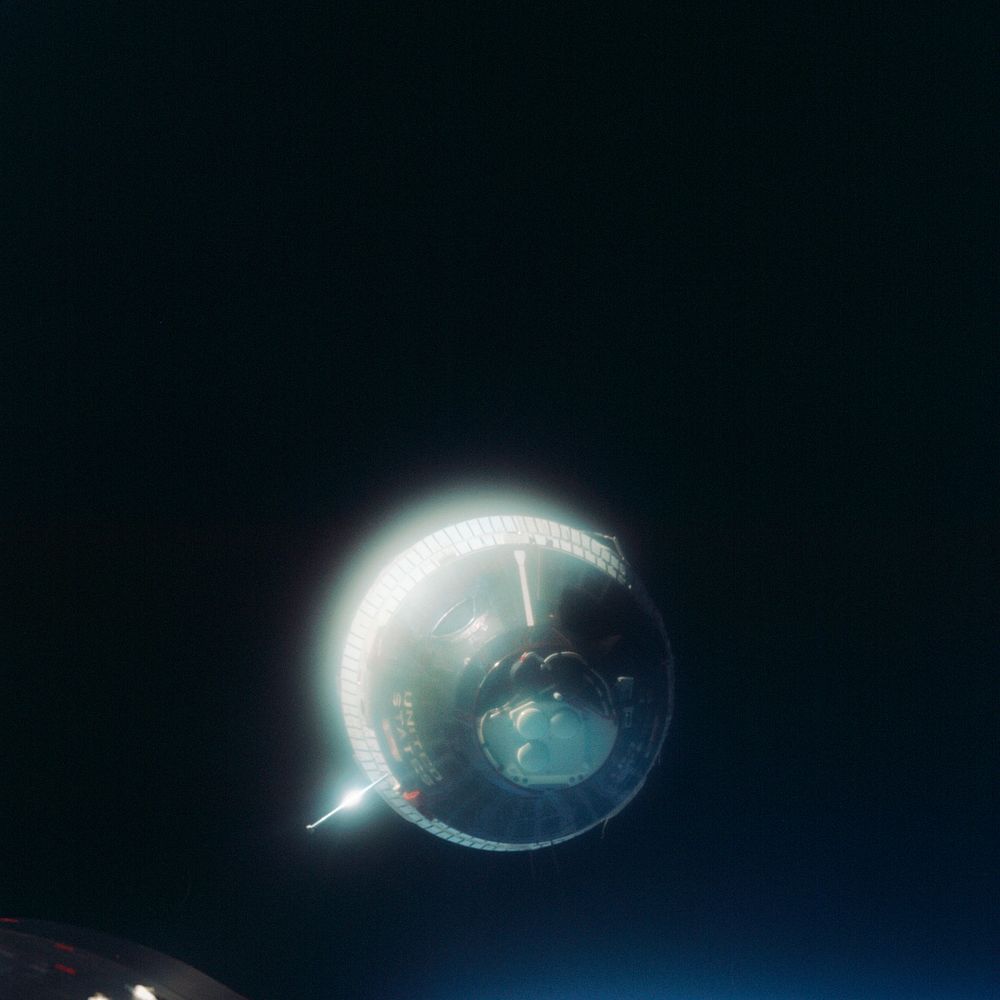 The Earth-orbiting Gemini-6 spacecraft against the blackness of space. Original from NASA. Digitally enhanced by rawpixel.