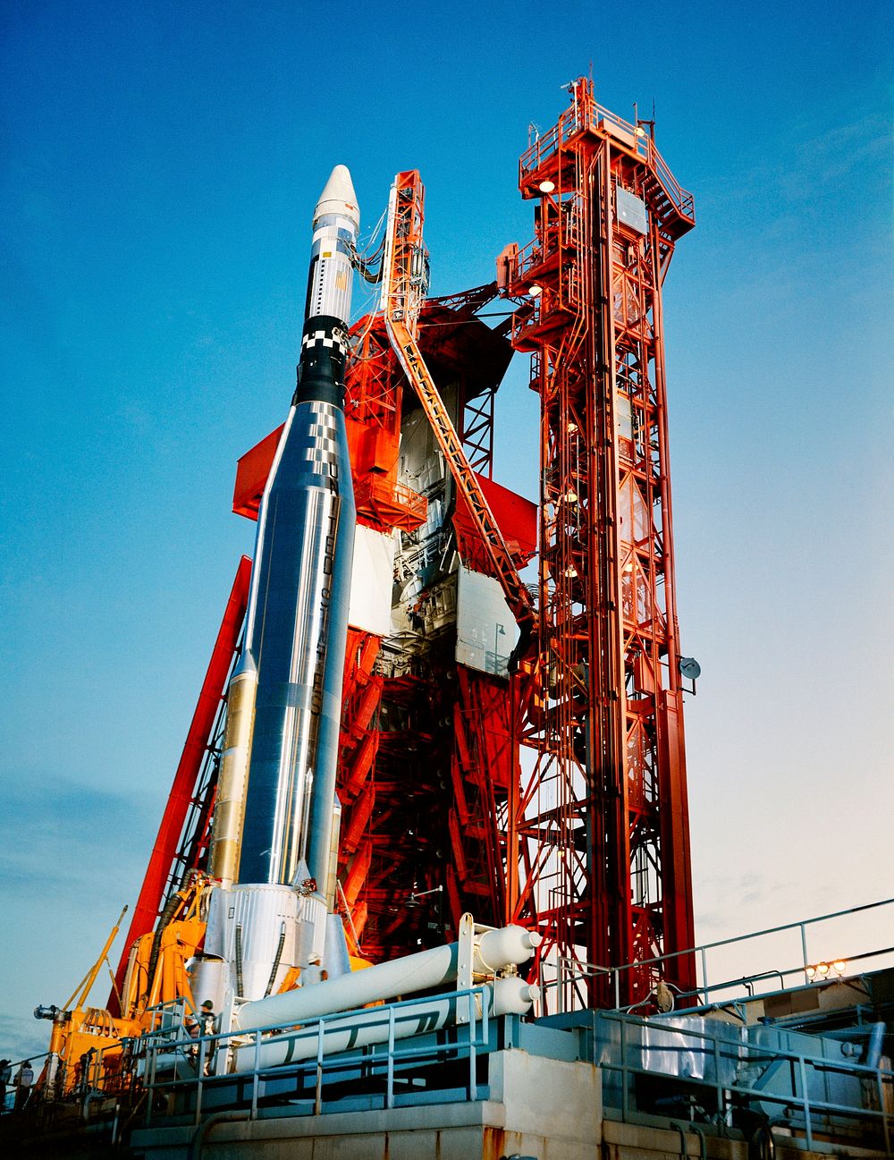 An Agena Target Docking Vehicle atop its Atlas launch vehicle is ready for launch at Launch Complex 14 at Cape Kennedy…