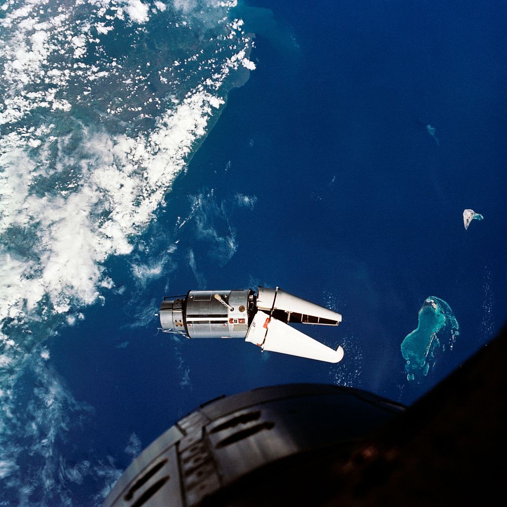The Augmented Target Docking Adapter (ATDA) as seen from the Gemini-9 spacecraft during one of their three rendezvous in…