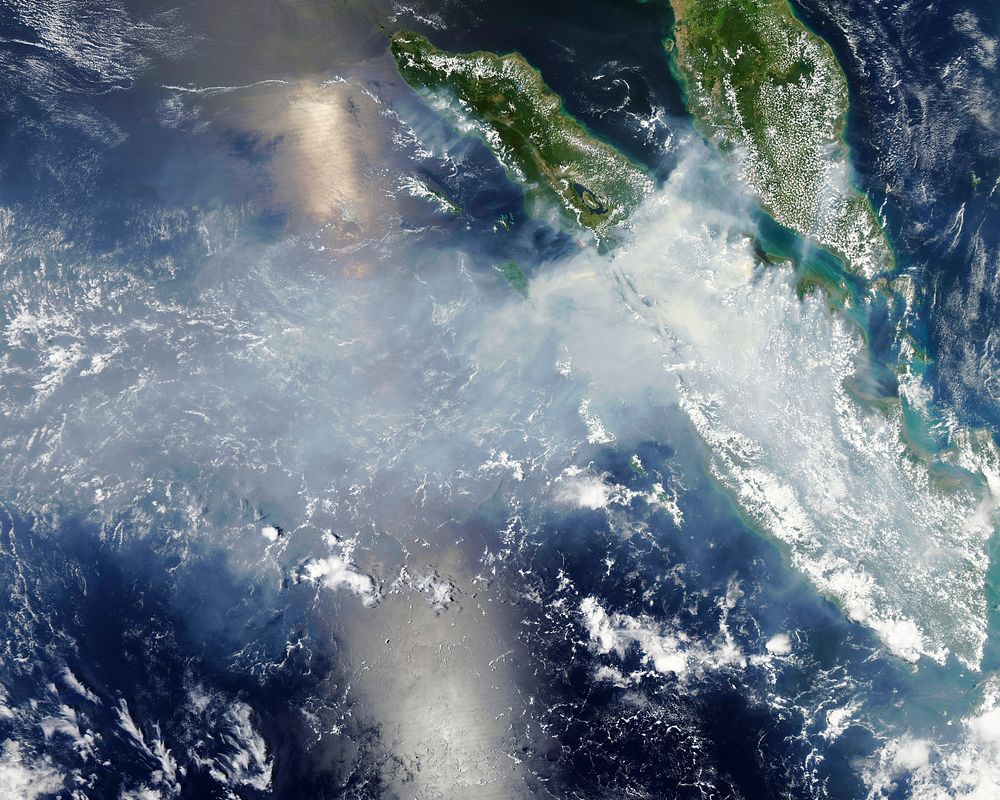 Smoke and fires from Sumatra. Original from NASA. Digitally enhanced by rawpixel.