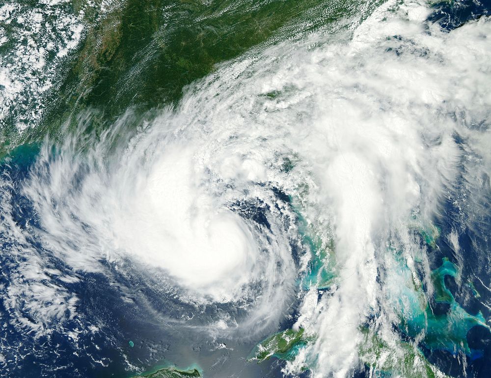 Tropical Storm Isaac moving northwest through the Gulf of Mexico, with its eastern cloud covering over the entire state of…