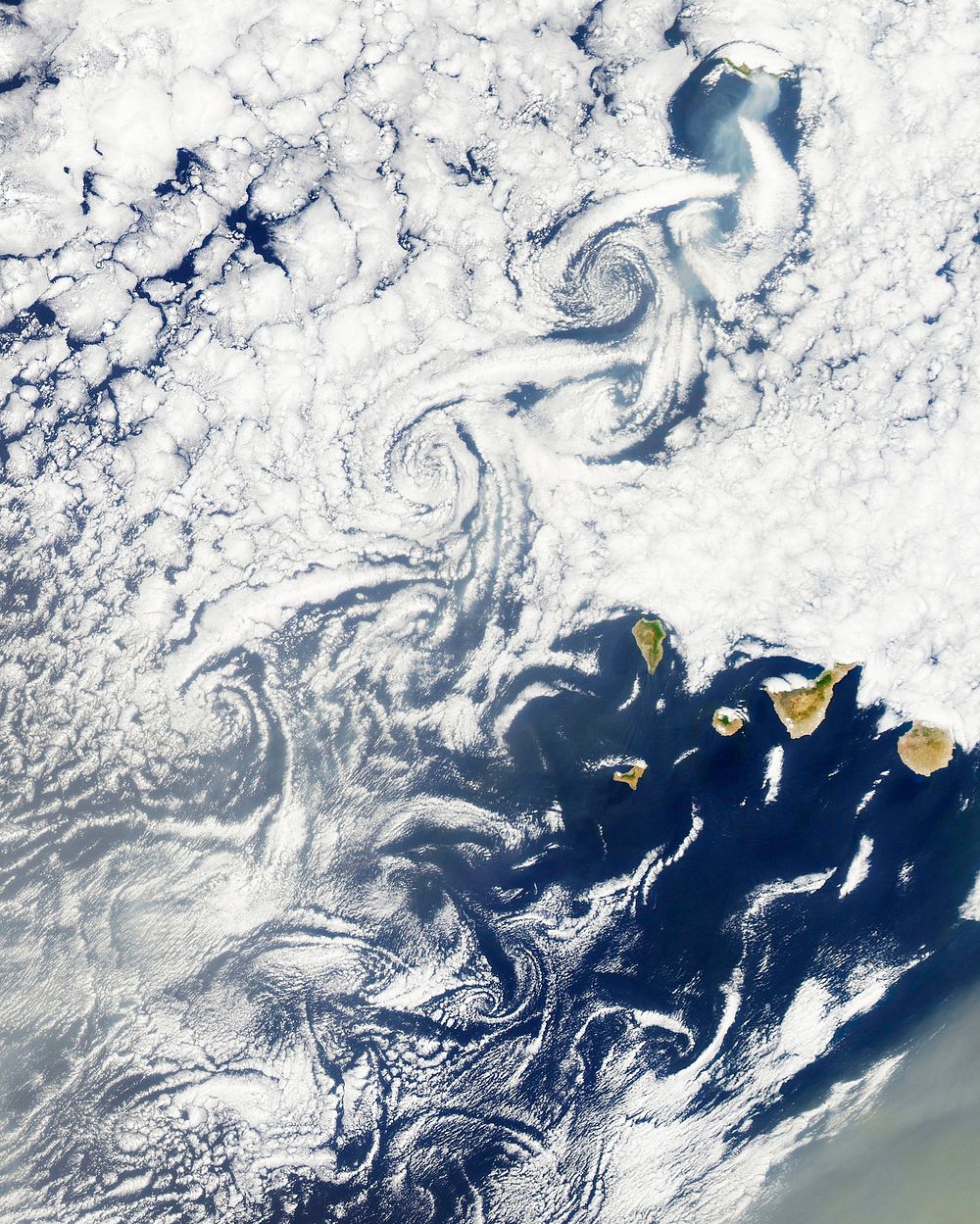 Cloud vortices off Madeira and Canary Islands. Original from NASA. Digitally enhanced by rawpixel.