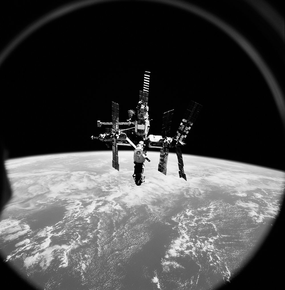 Russia's Mir space station is backdropped against Earth's horizon. Original from NASA. Digitally enhanced by rawpixel.