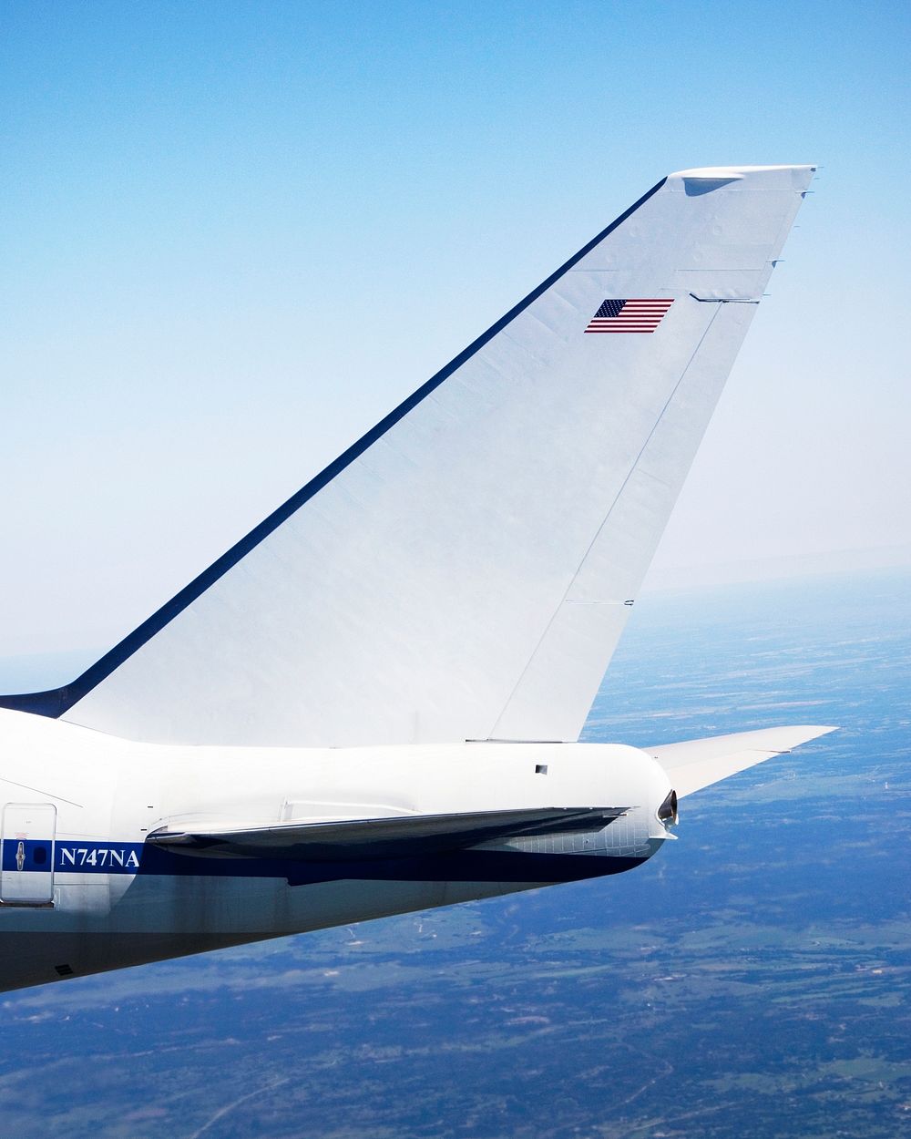 Logos of NASA and the German Aerospace Center (DLR) are displayed prominently on the tail of the Stratospheric Observatory…