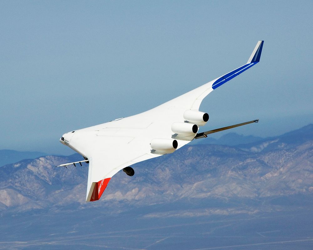 The X-48B Blended Wing Body research aircraft banks smartly in this Block 2 flight phase image. April 4, 2008. Original from…