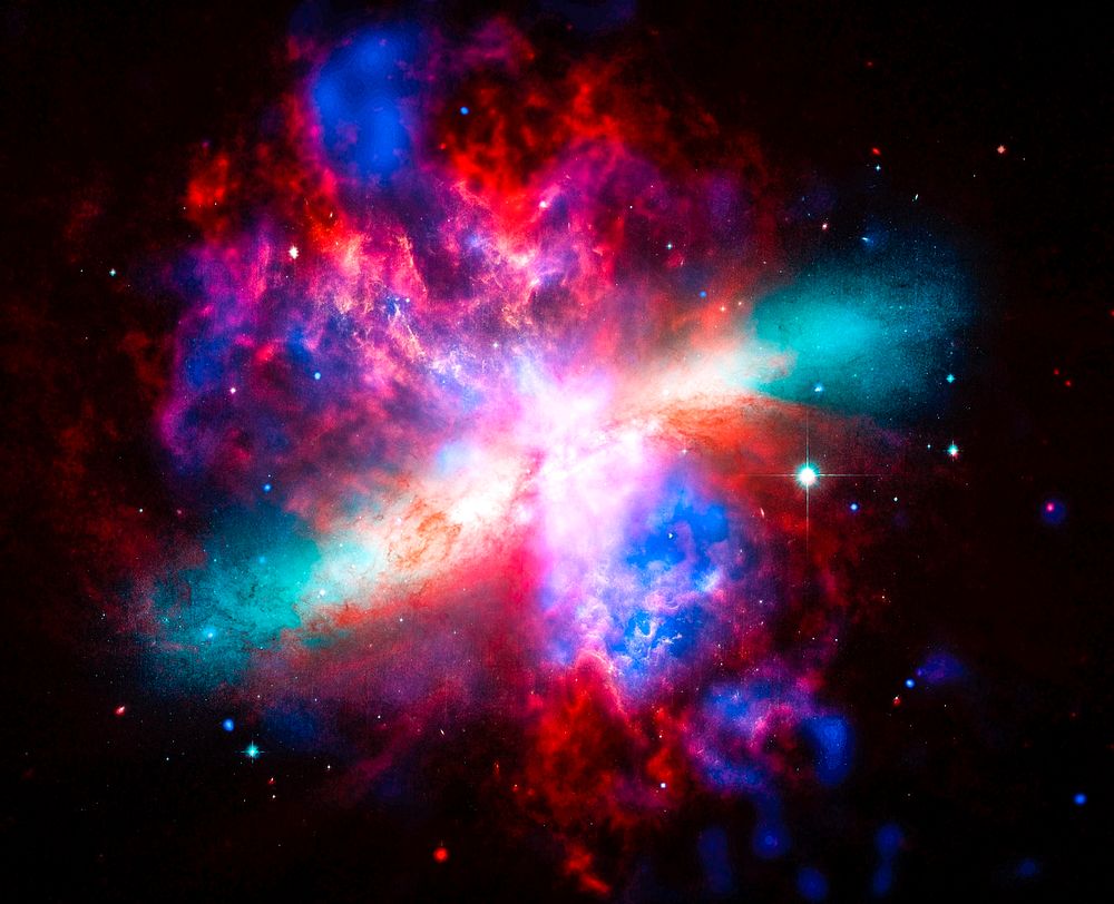Multi-wavelength, false-colored view of the M82 galaxy. Original from NASA. Digitally enhanced by rawpixel.