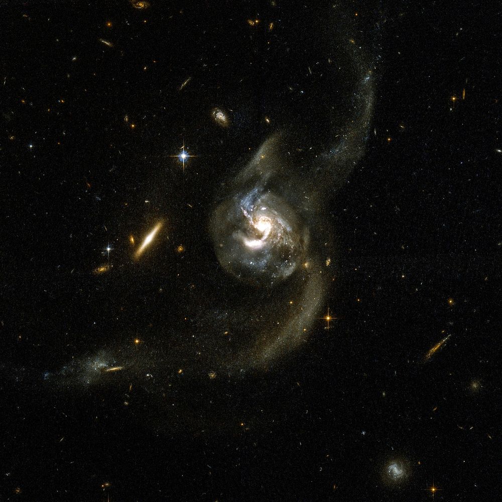 NGC 6090 is a beautiful pair of spiral galaxies. Original from NASA. Digitally enhanced by rawpixel.