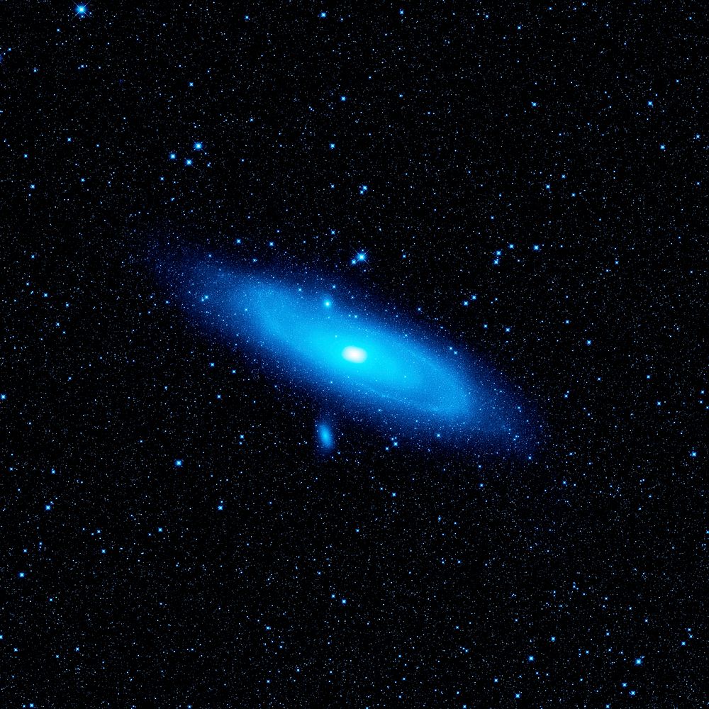 The Andromeda galaxy's older stellar population in blue. Original from NASA. Digitally enhanced by rawpixel.