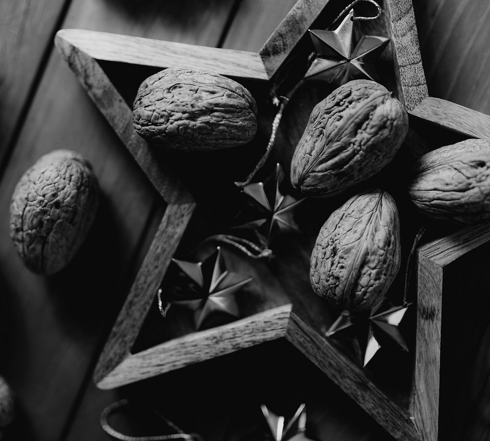 Walnuts in a wooden star frame