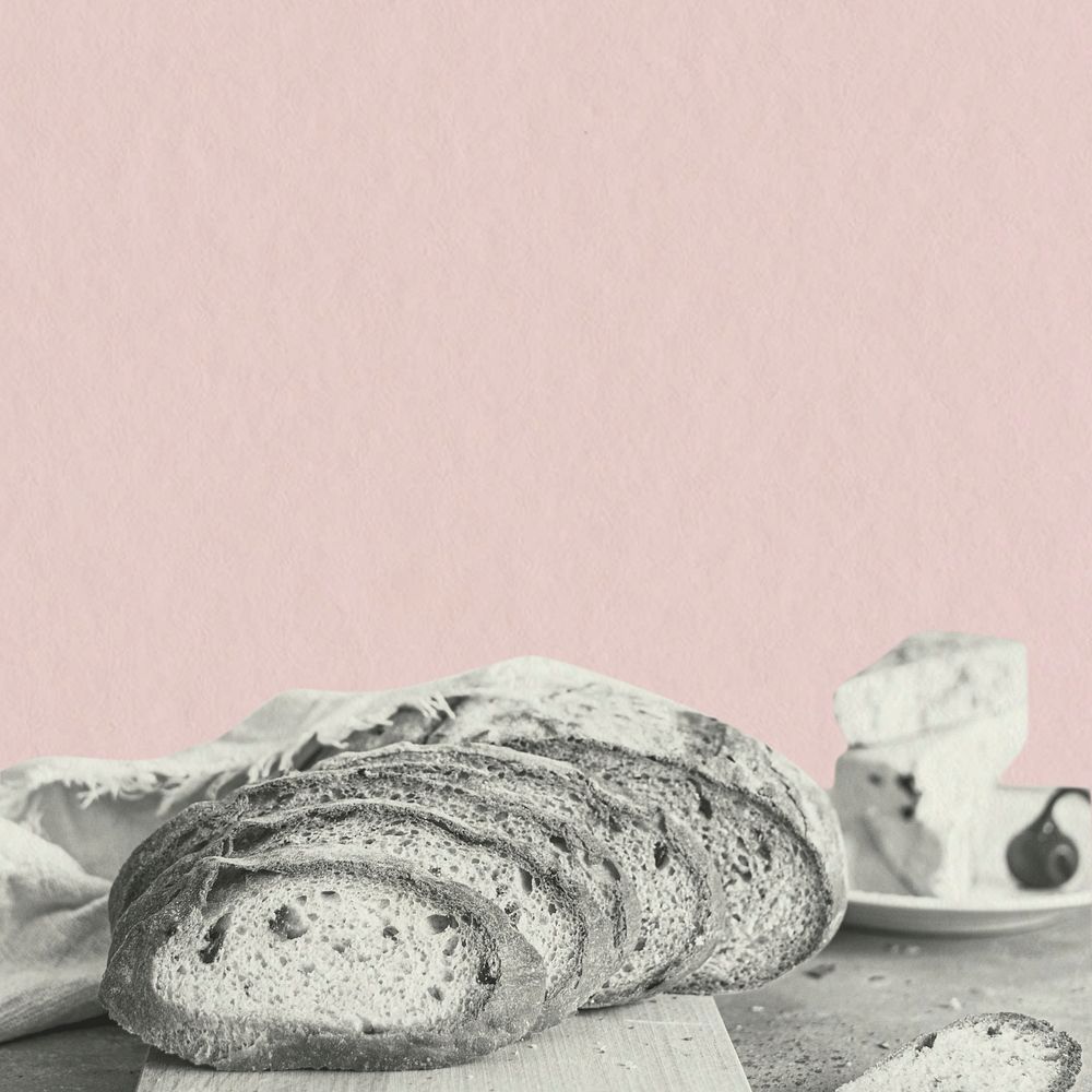 Slices of wheat loaf on pink background