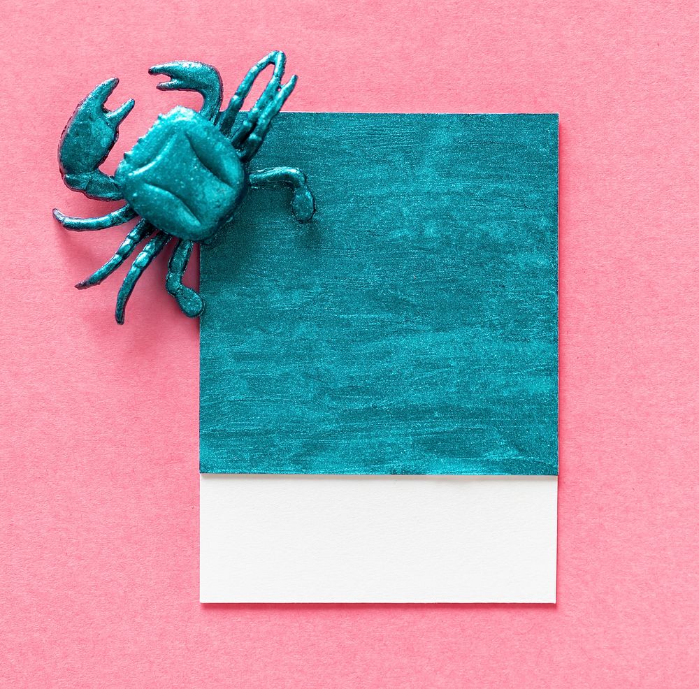 Little cute crab on a paper