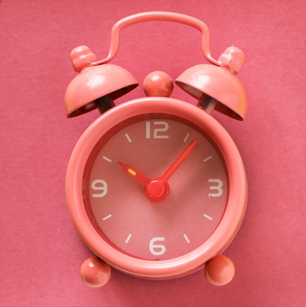 Pink pastel analog alarm clock