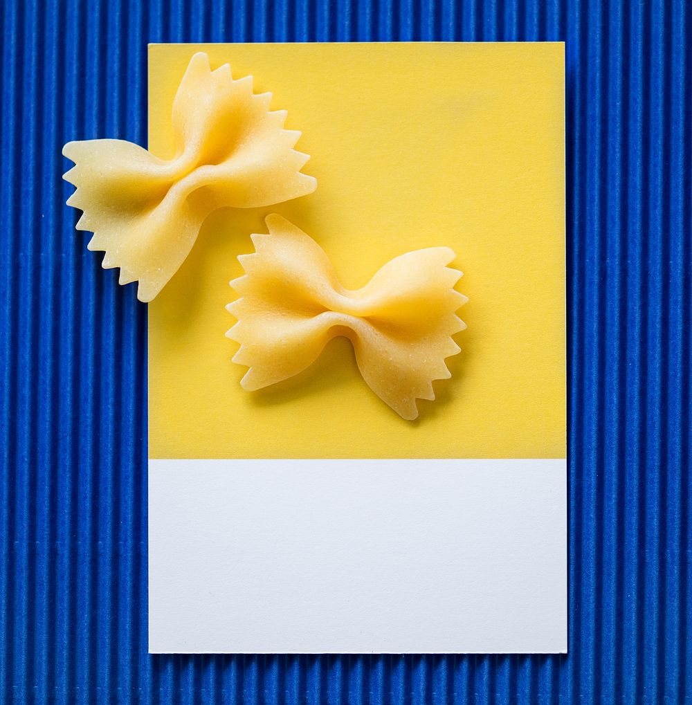 Farfalle pasta on a yellow card