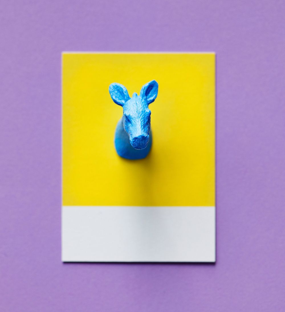 Colorful cow figure on a paper