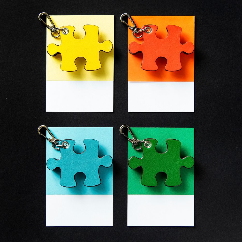 Colorful puzzle shaped pieces keychain