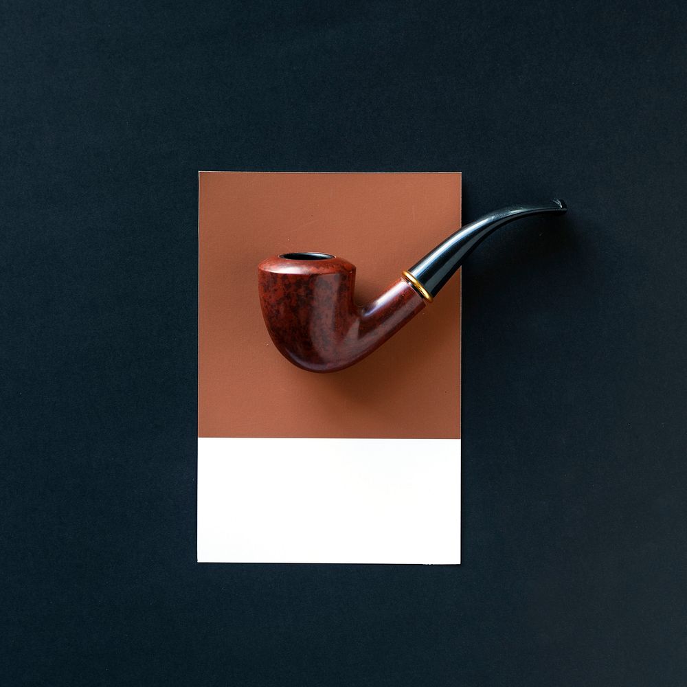 A wooden tobacco smoking pipe
