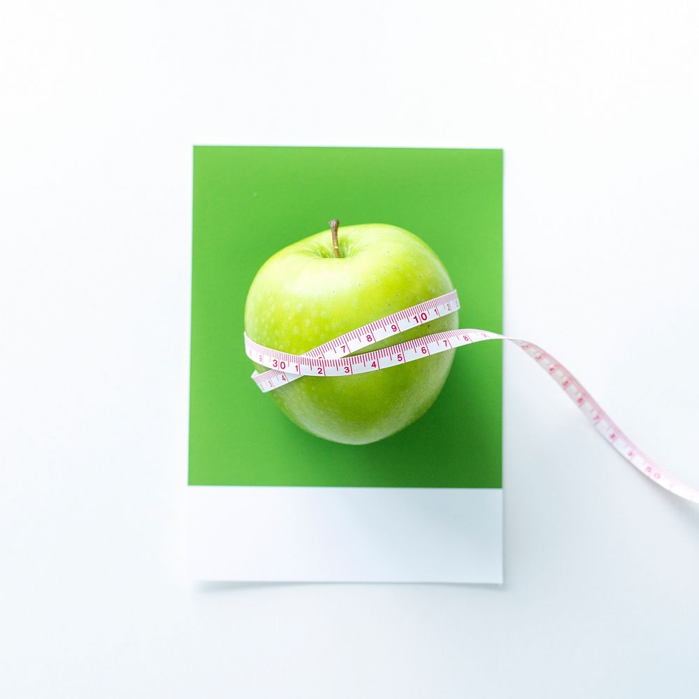 Tape measure around an apple