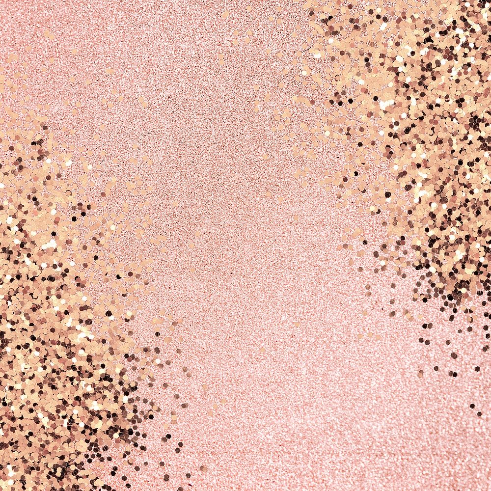 Gold glitter confetti on a pink background 