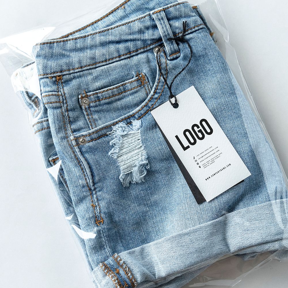 Ripped jean shorts with a tag mockup