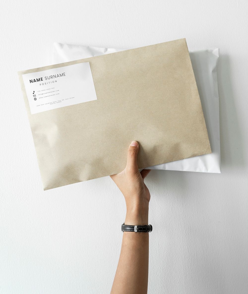 Woman holding two package mockups