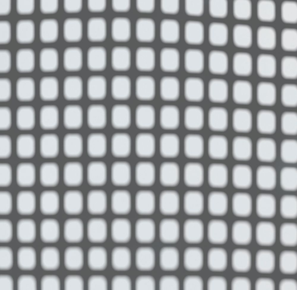 Shadow of wire mesh on a wall psd