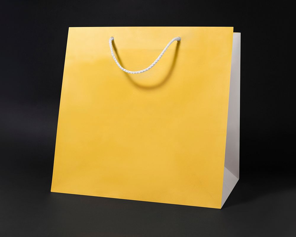 Yellow paper shopping bag, simple design space