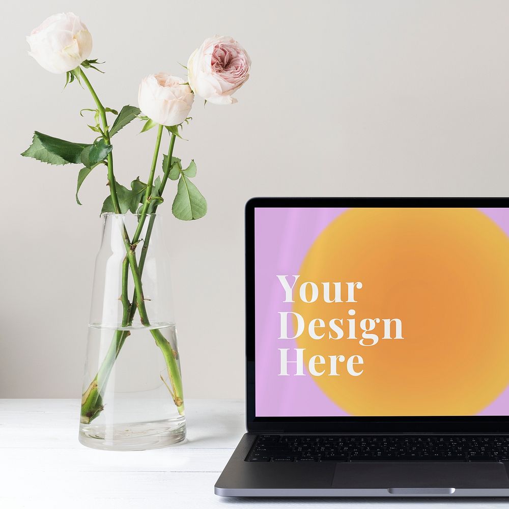 Laptop screen mockup psd, minimal workspace, white flower decoration