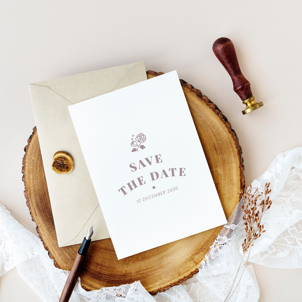 White wedding invitation card template mockup on a wooden plate