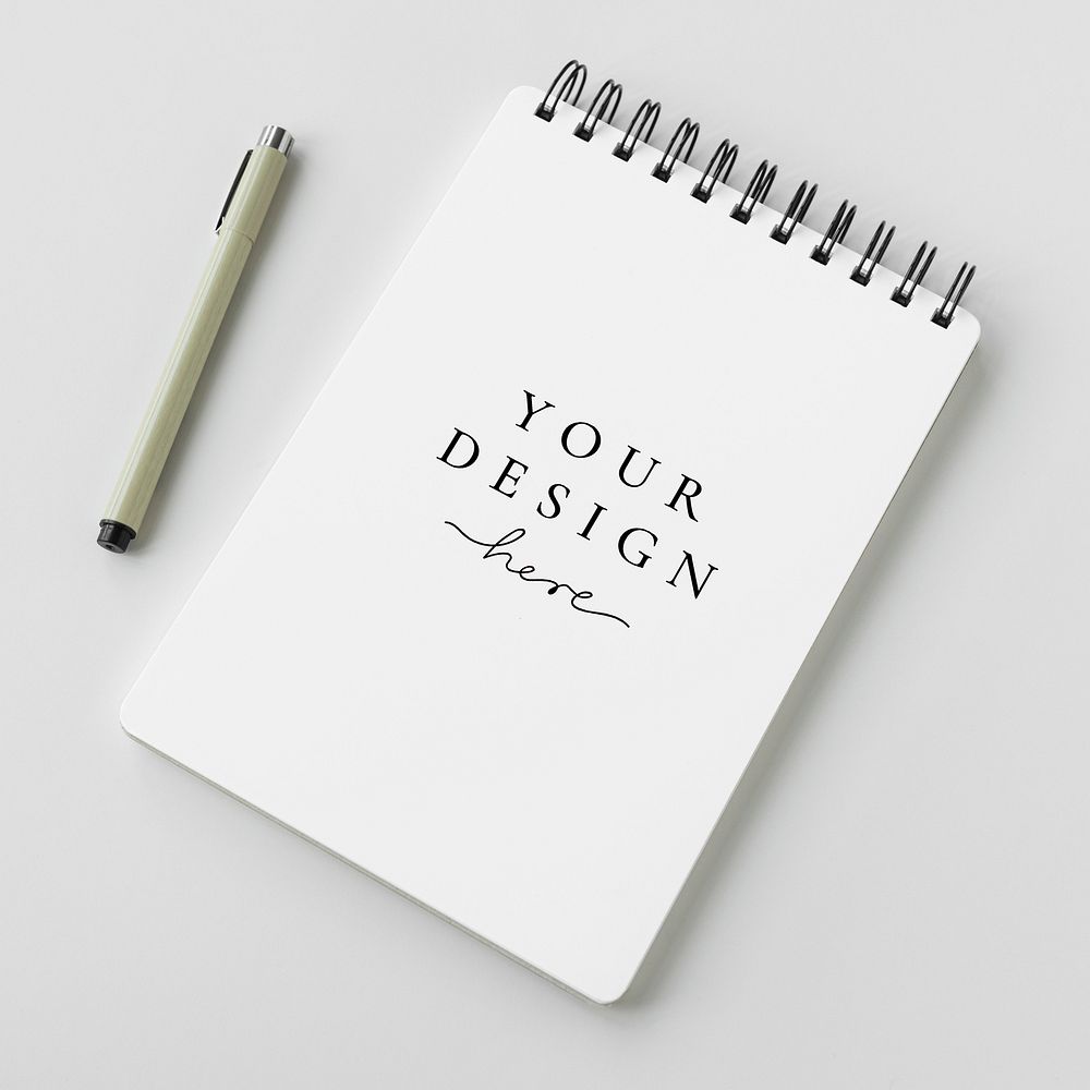 Blank plain white notebook with a pen mockup