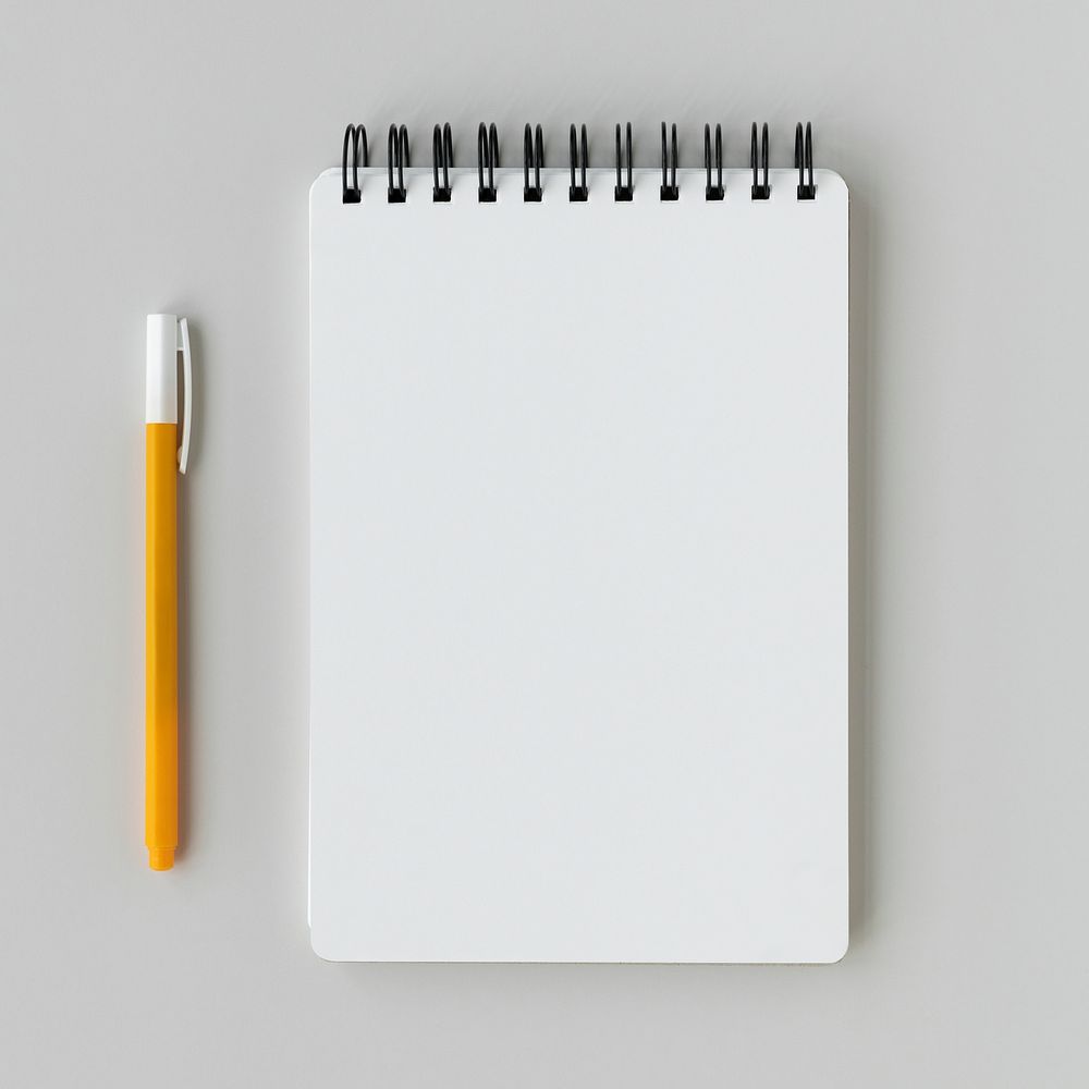 Blank plain white notebook with a yellow pen mockup