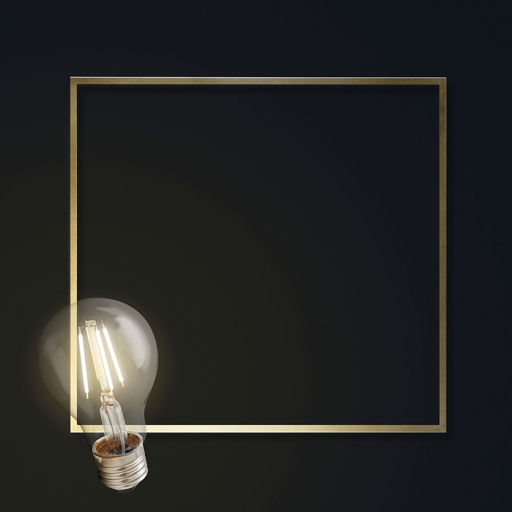 Light bulb with a gold frame on a black background