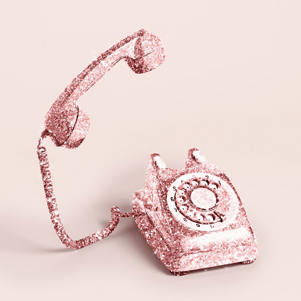 Glittery pink rotary dial on a light pink background 