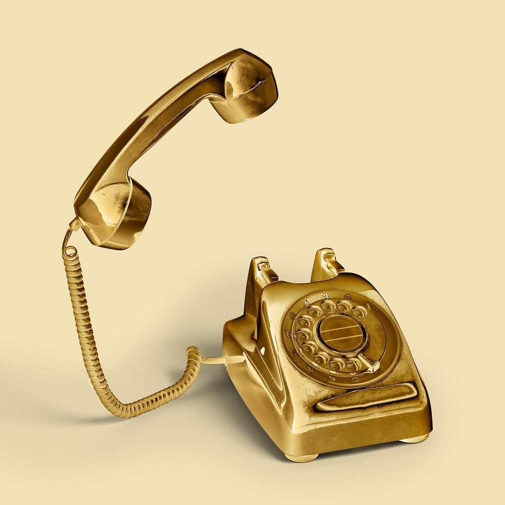 Golden rotary dial on a beige background