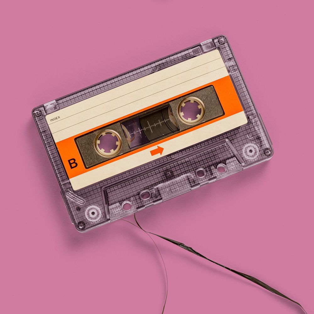 Old school cassette tape mockup on a pink background
