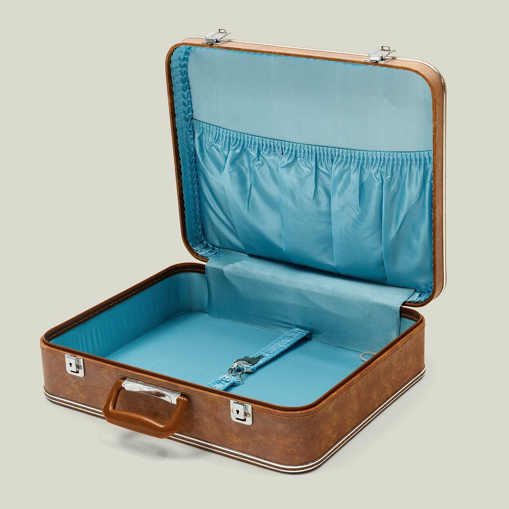 Unlock vintage brown leather briefcase on green background