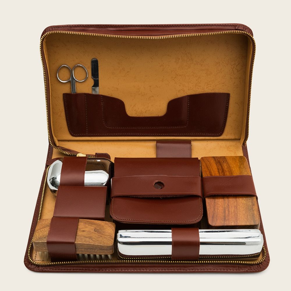 Travel kit in a brown leather bag mockup design resource