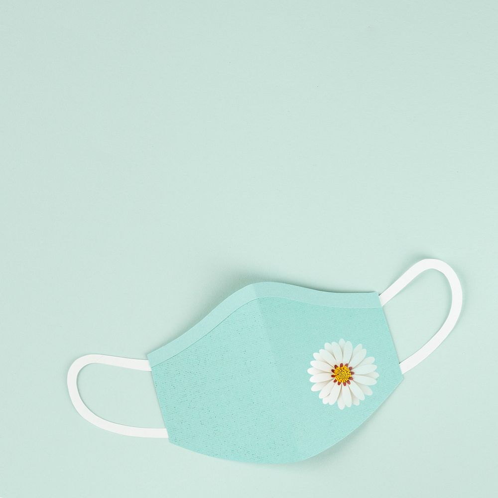 Paper craft surgical mask on a green background illustration
