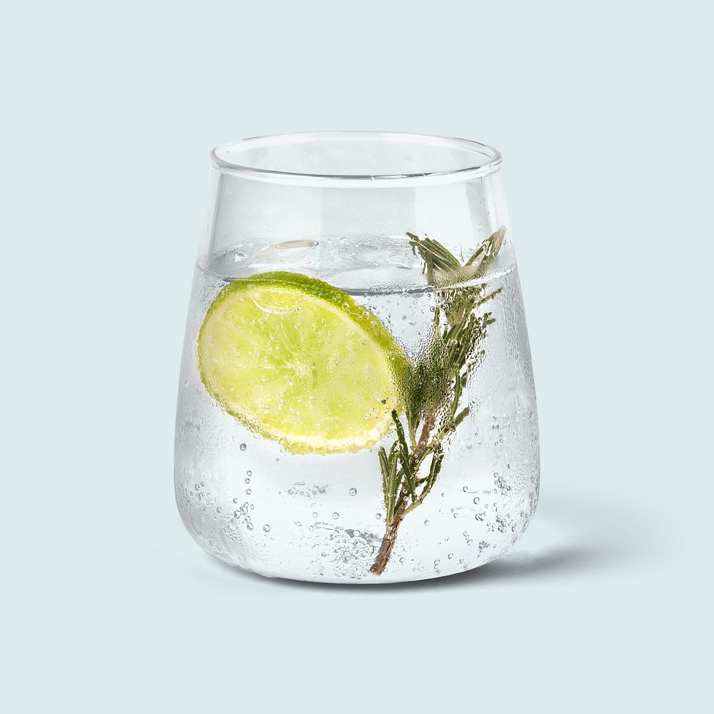 Gin and tonic with rosemary background 