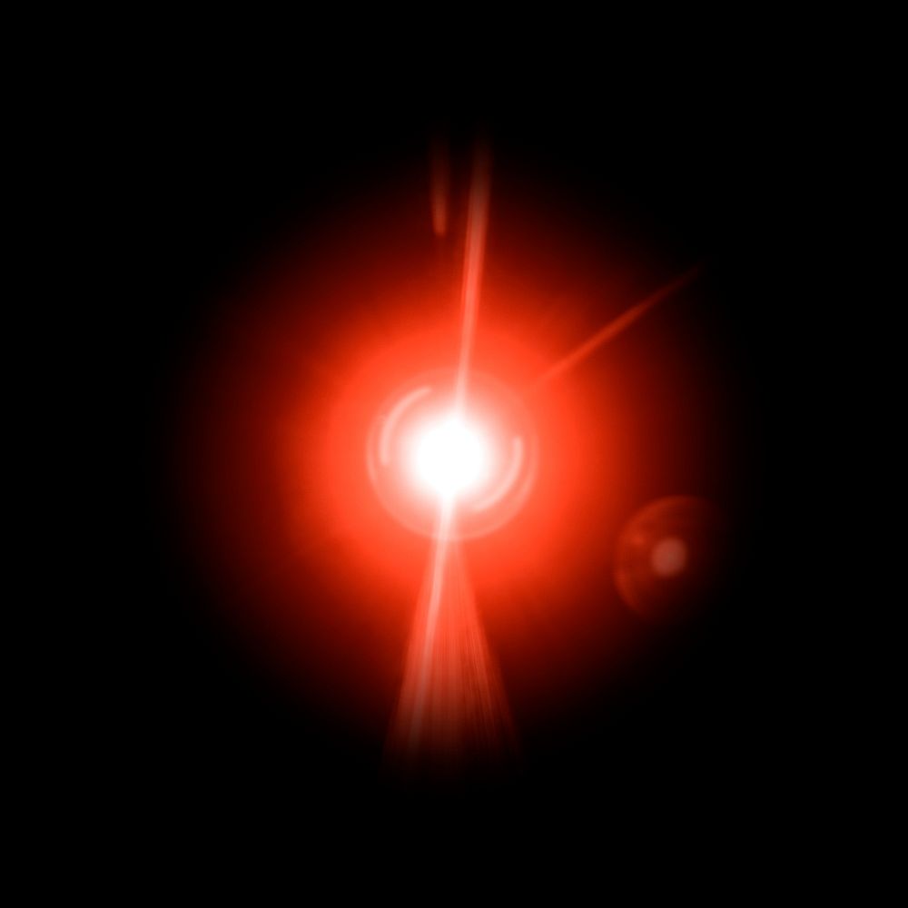 Red lens flare effect design element on a black background