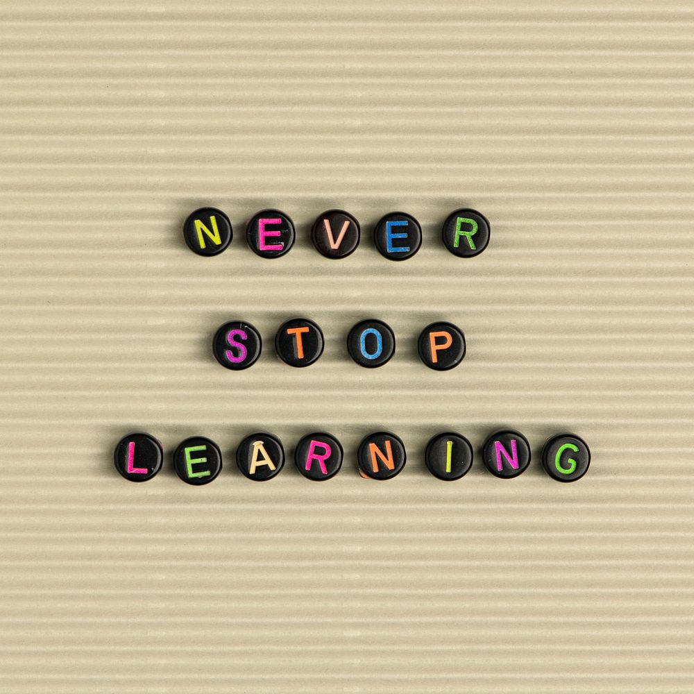 NEVER STOP LEARNING  beads message typography