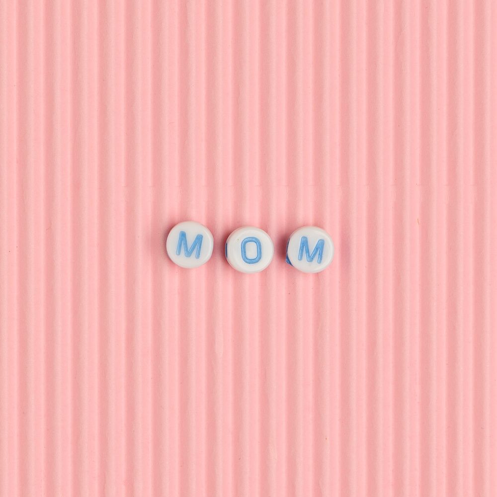 MOM beads text typography on pink